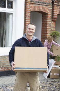 Moving team loading boxes for a home move in Streatham