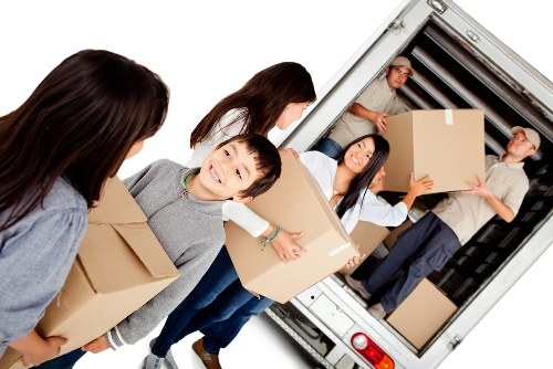 Removal team preparing a family house move in Streatham