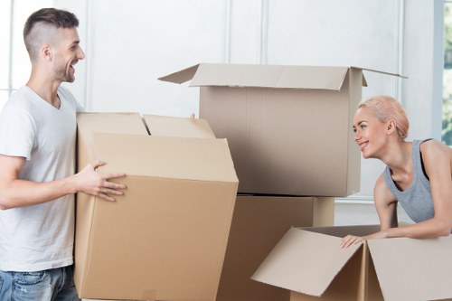 Team preparing furniture and IT equipment for an office relocation in Streatham