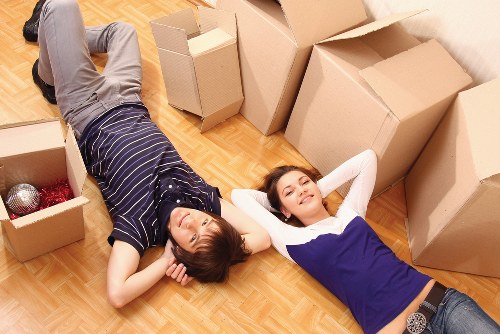 Movers handling furniture during a Streatham house move